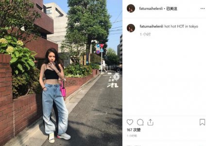 李咏女儿晒街拍美照 身穿吊带背心露出性感小蛮腰