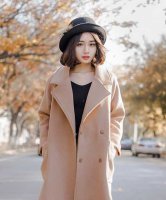 冬季戴帽子怎么配发型？这些美眉有新招