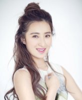 披腰长发半丸子头图片 长发怎样扎半丸子头