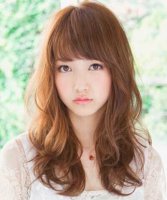 长脸女生合适的发型 五款长卷发修饰小脸
